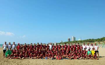 The youth of the AC Milan Junior Camp on the beach of Lignano Sabbiadoro