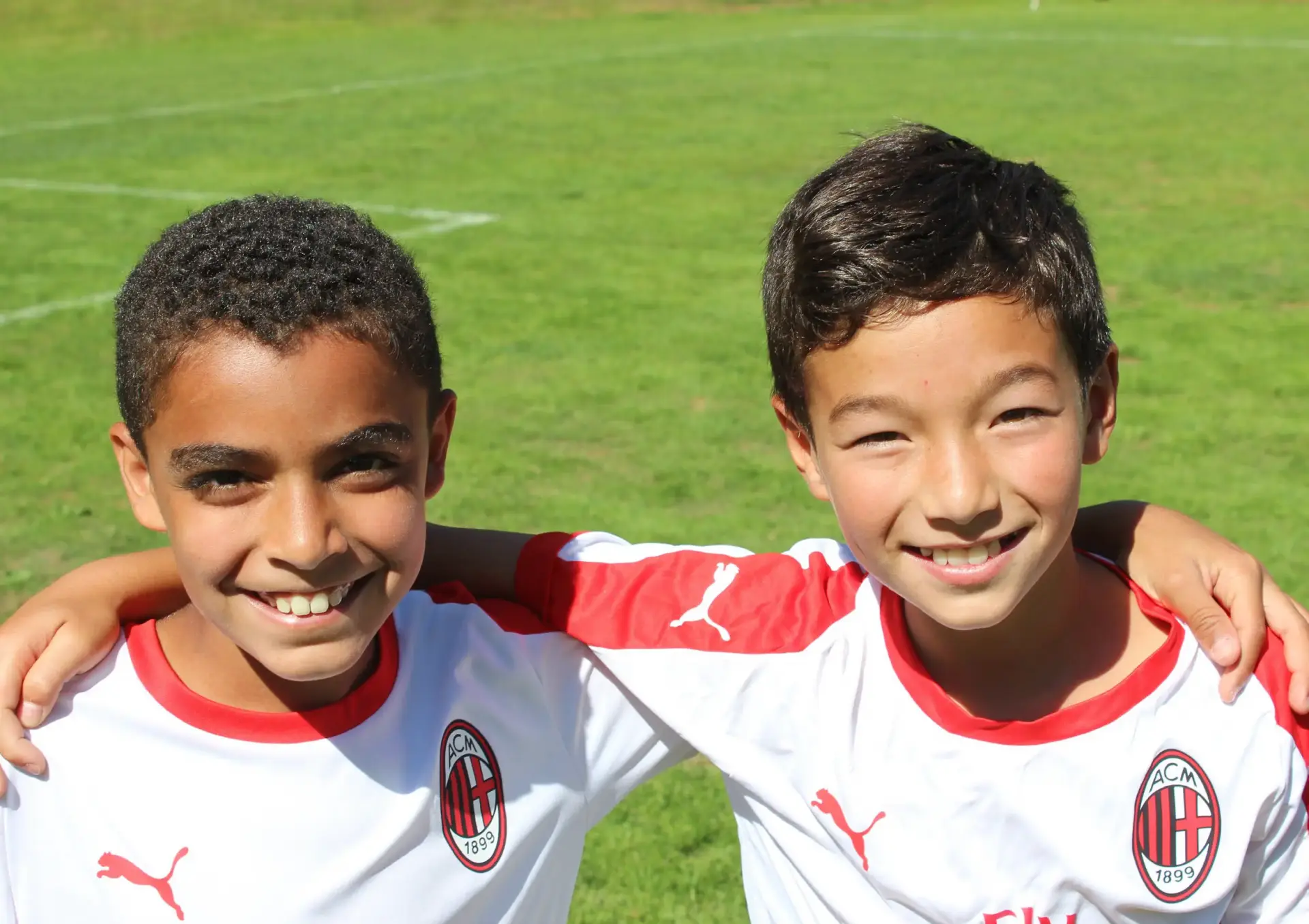 Two boys from different countries in the AC Milan Academy Junior Camp on Demand