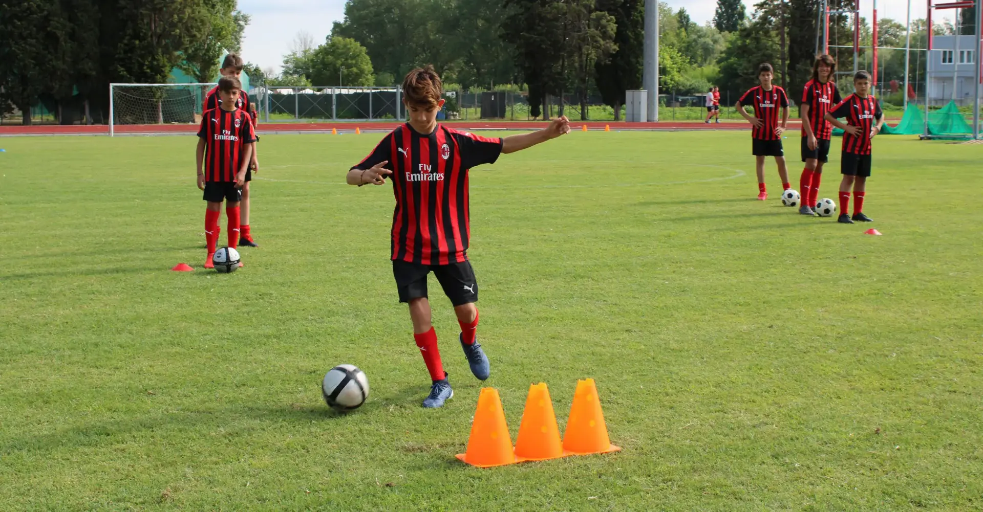 Young soccer players in dribling training during the AC Milan Academy Camp